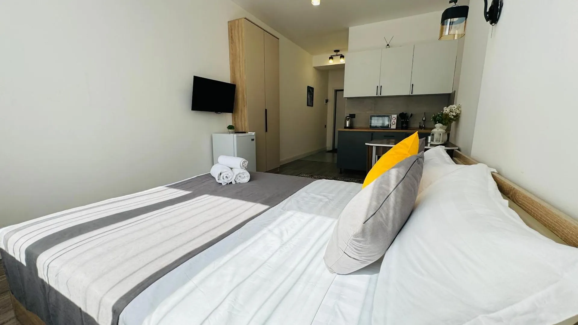 417I1 Gray And Yellow Apartment Sholpan City Almaty